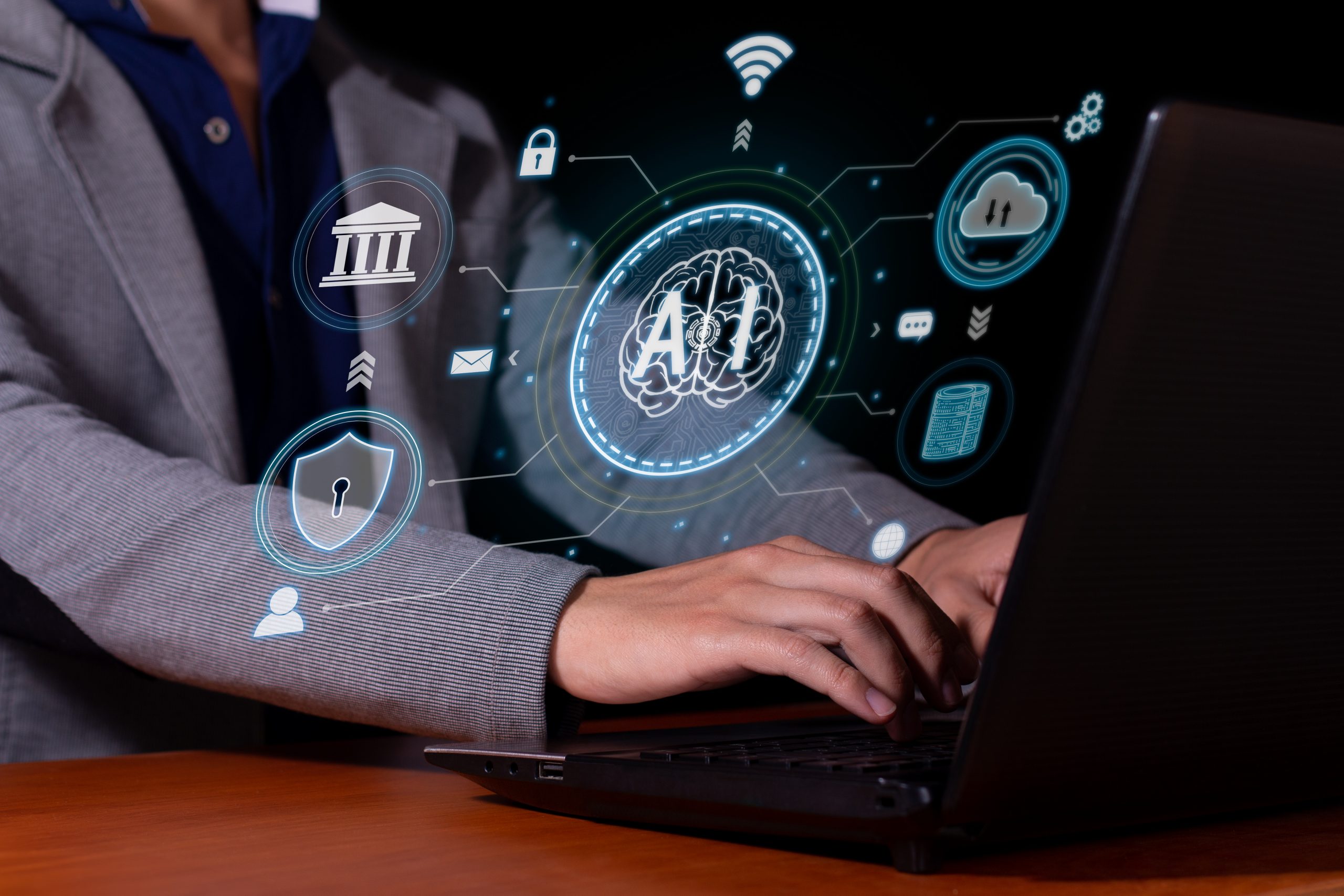 uomo che lazora al pc con AI