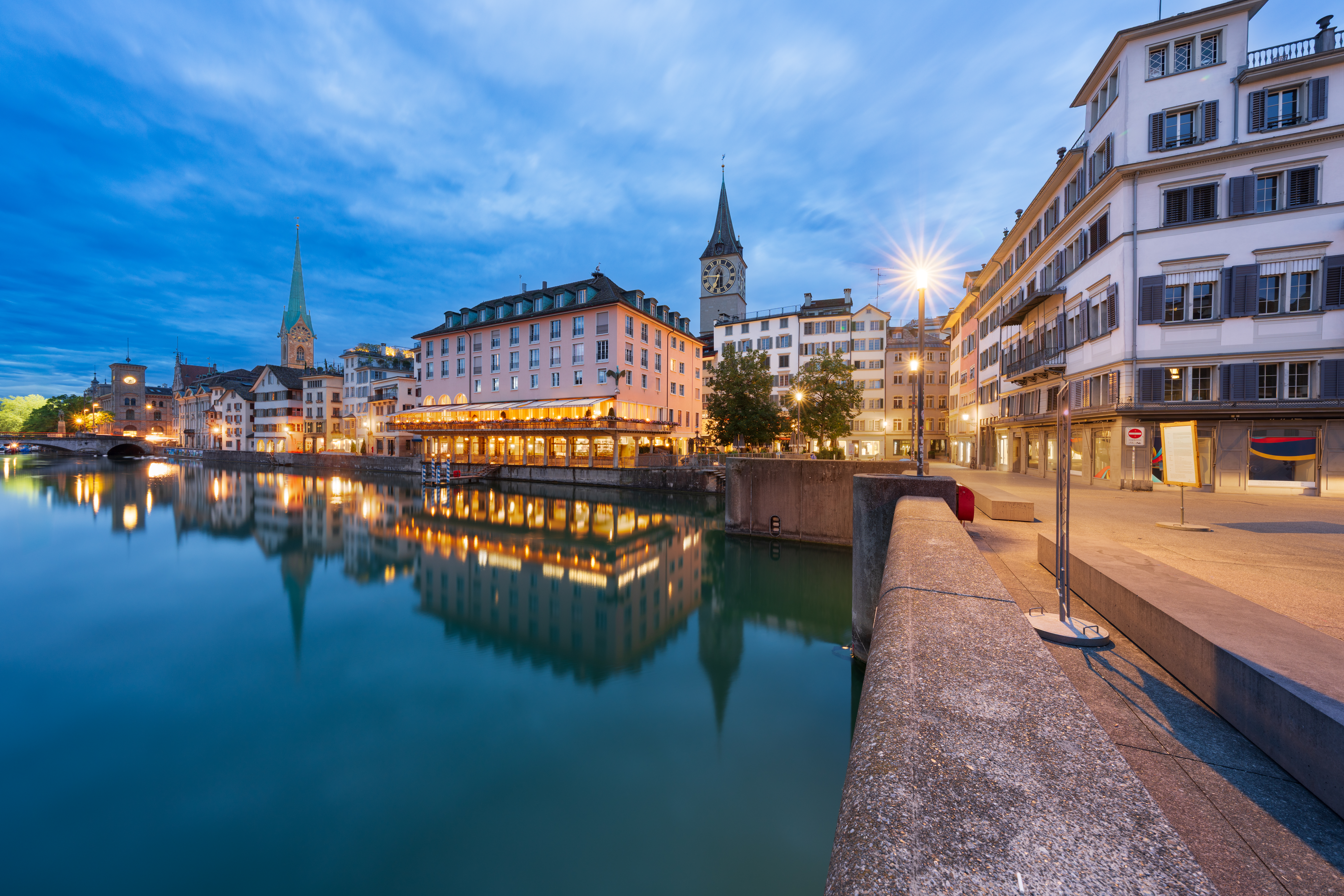 Zurich, Switzerland on the Limmat River at blue hour.